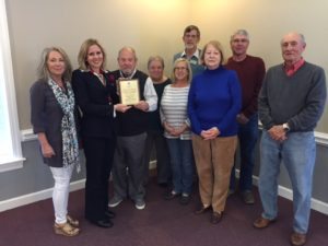 Plaque presented to Michelle Griffin, Chair of the Ocean Isle Beach Flotilla and Debbie Tucker OIB Flotilla committee member by Mr. Bill Hadesty, BFA Chairman; Steve Long Vice Chairman and Sue Brandon, Secretary and Board members Rev. John Causey, Karla Squire, Len Bernauer and Jayne Mathews